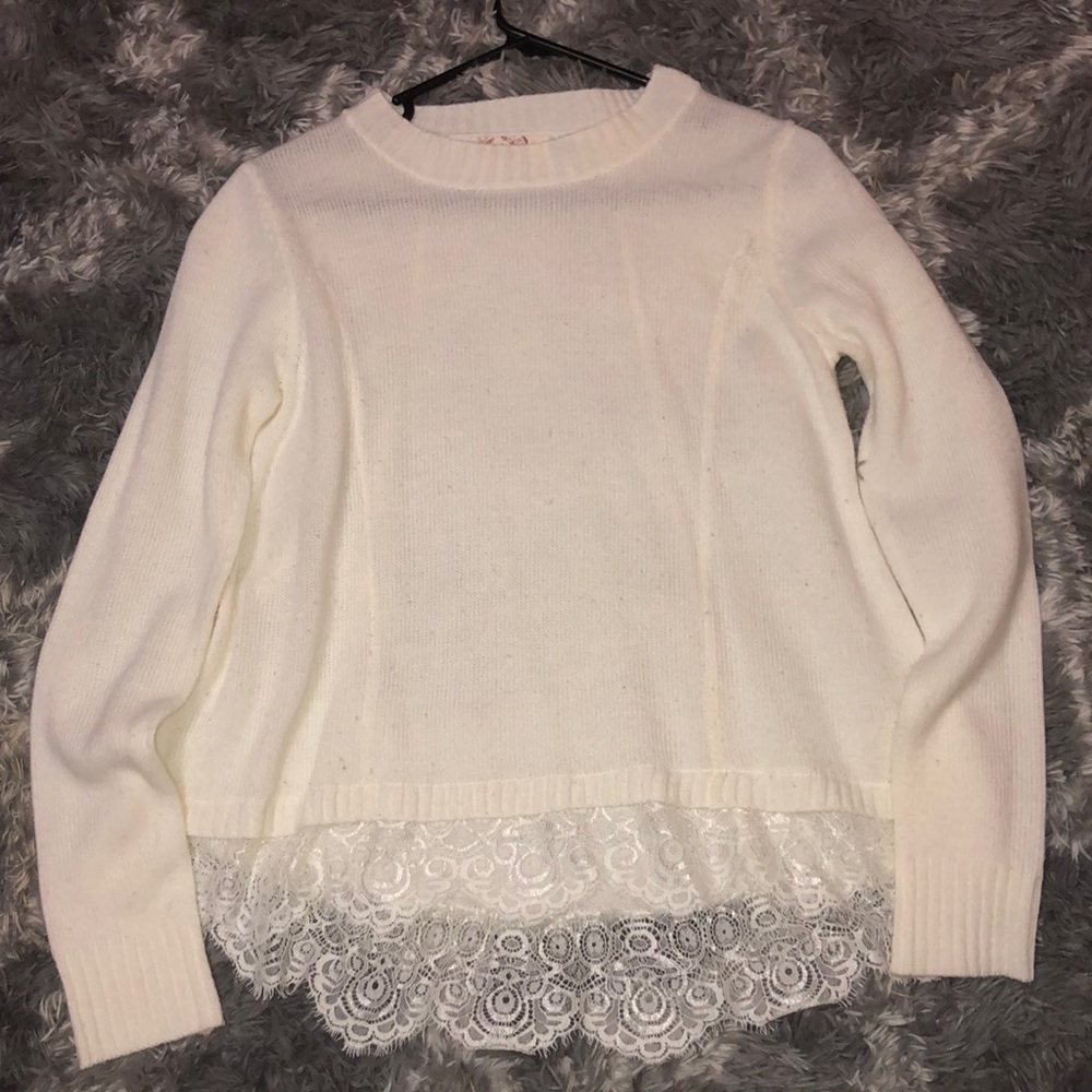 off white sweater with laced bottom